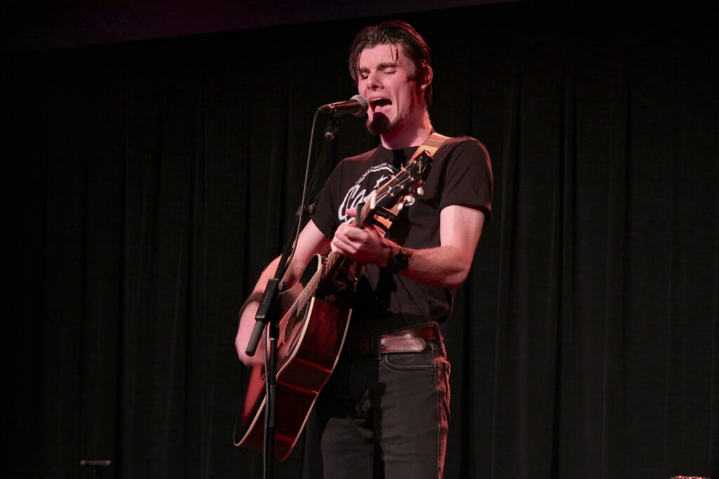 Preston Cooper performing at The Lounge at Live Nation in Toronto on Oct. 21, 2025. (Photo credit: Angela McLean/Love at First Listen)