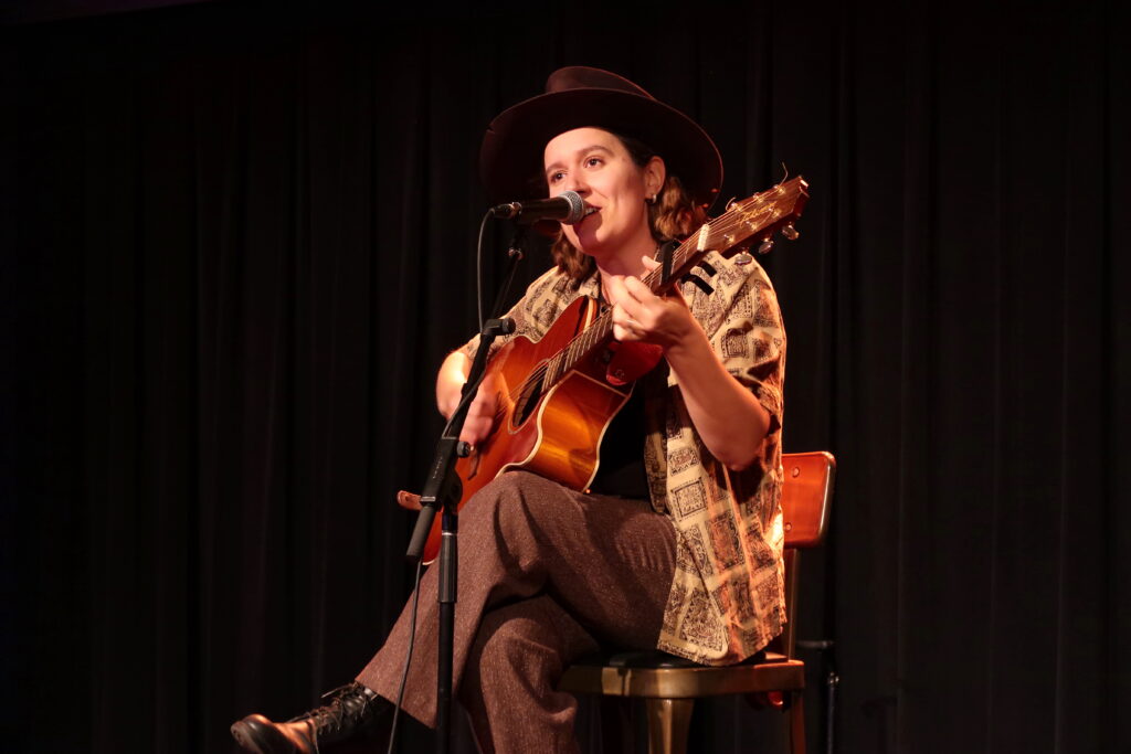 Sarah Vanderzon performing at The Lounge at Live Nation in Toronto on Oct. 21, 2025. (Photo credit: Angela McLean/Love at First Listen)